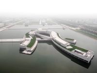 Front Aerial Building on the Water